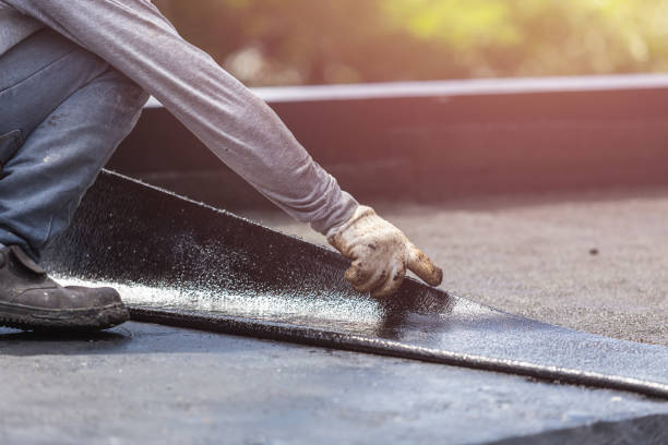 Professional Basement Waterproofing technician working in Vestaburg, MI